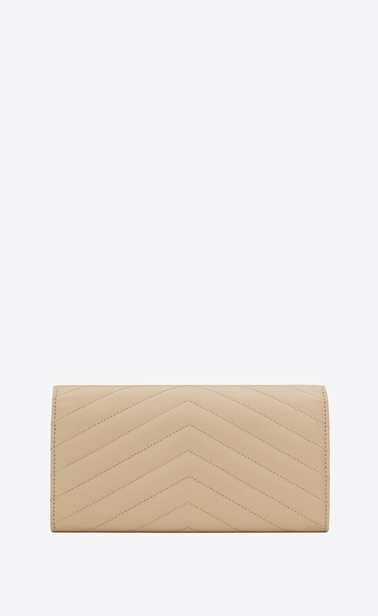 Monogram large flap wallet in grain de poudre embossed leather